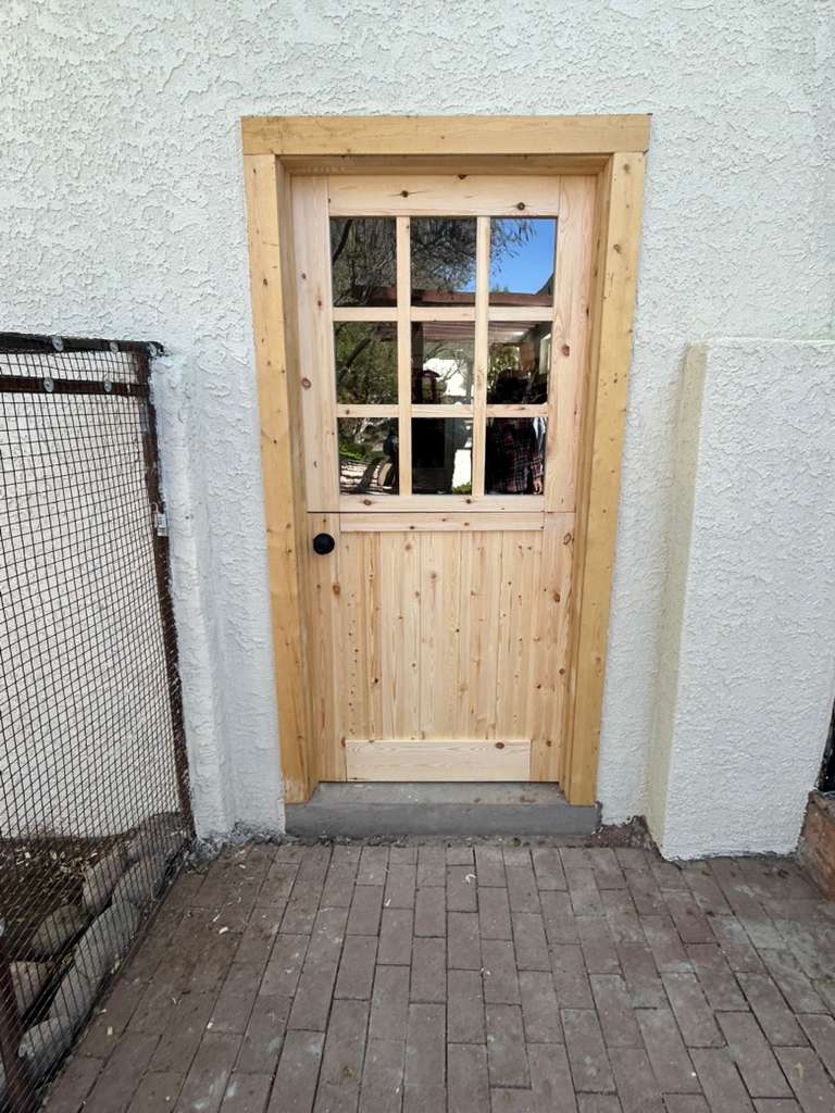 Custom door installation by JTEX Construction